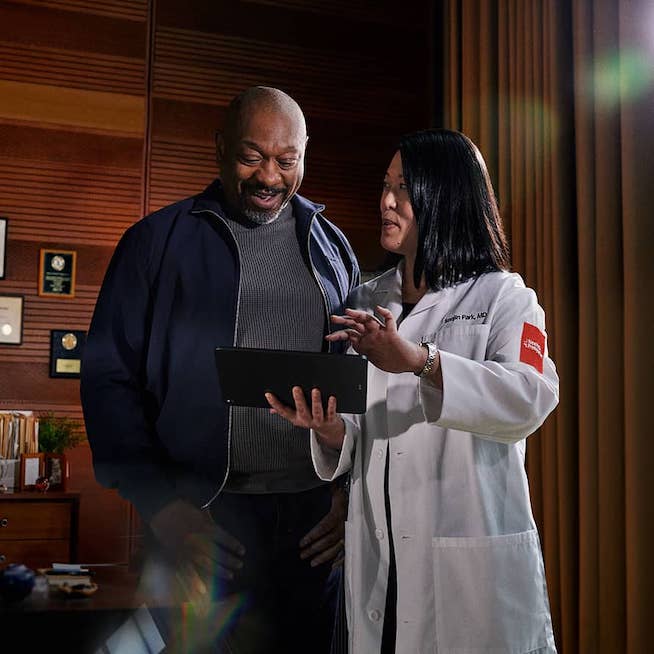 A doctor and patient speaking with each other